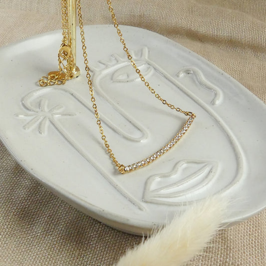 Collier barre pavé de cristaux plaqué or