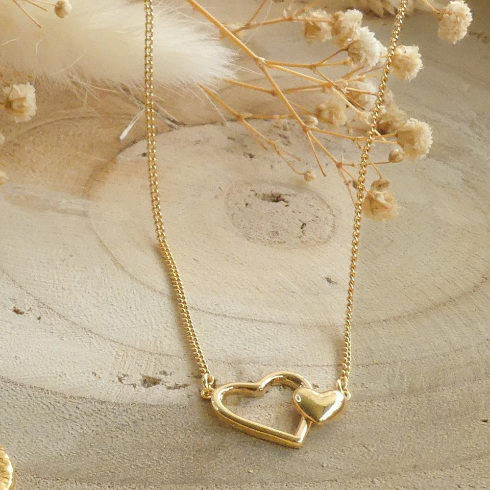 Collier double coeurs entrelacées