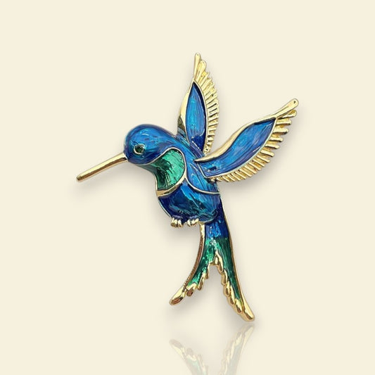 broche dorée Calliope, une broche colibri, bijou tendance en 2025