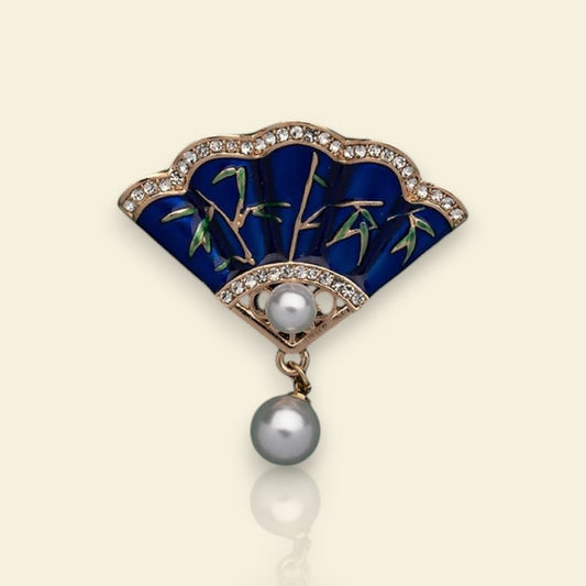 broche dorée Carmen, une broche élégante en forme d’éventail