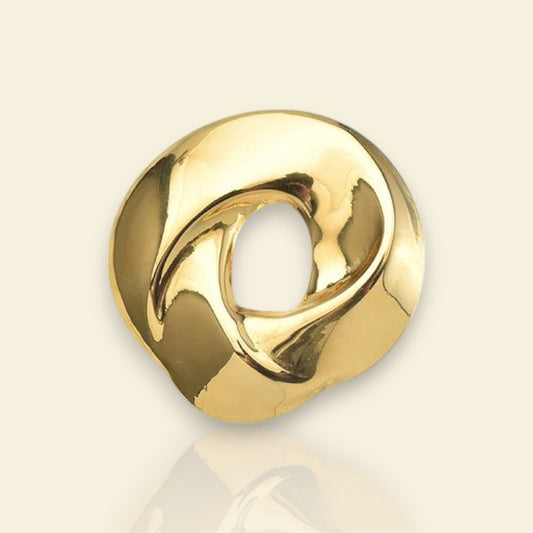 broche dorée Kalyon, une broche pour vêtements contemporaine