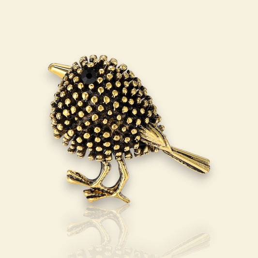 broche dorée Marlo, une broche oiseau, bijou tendance en 2025