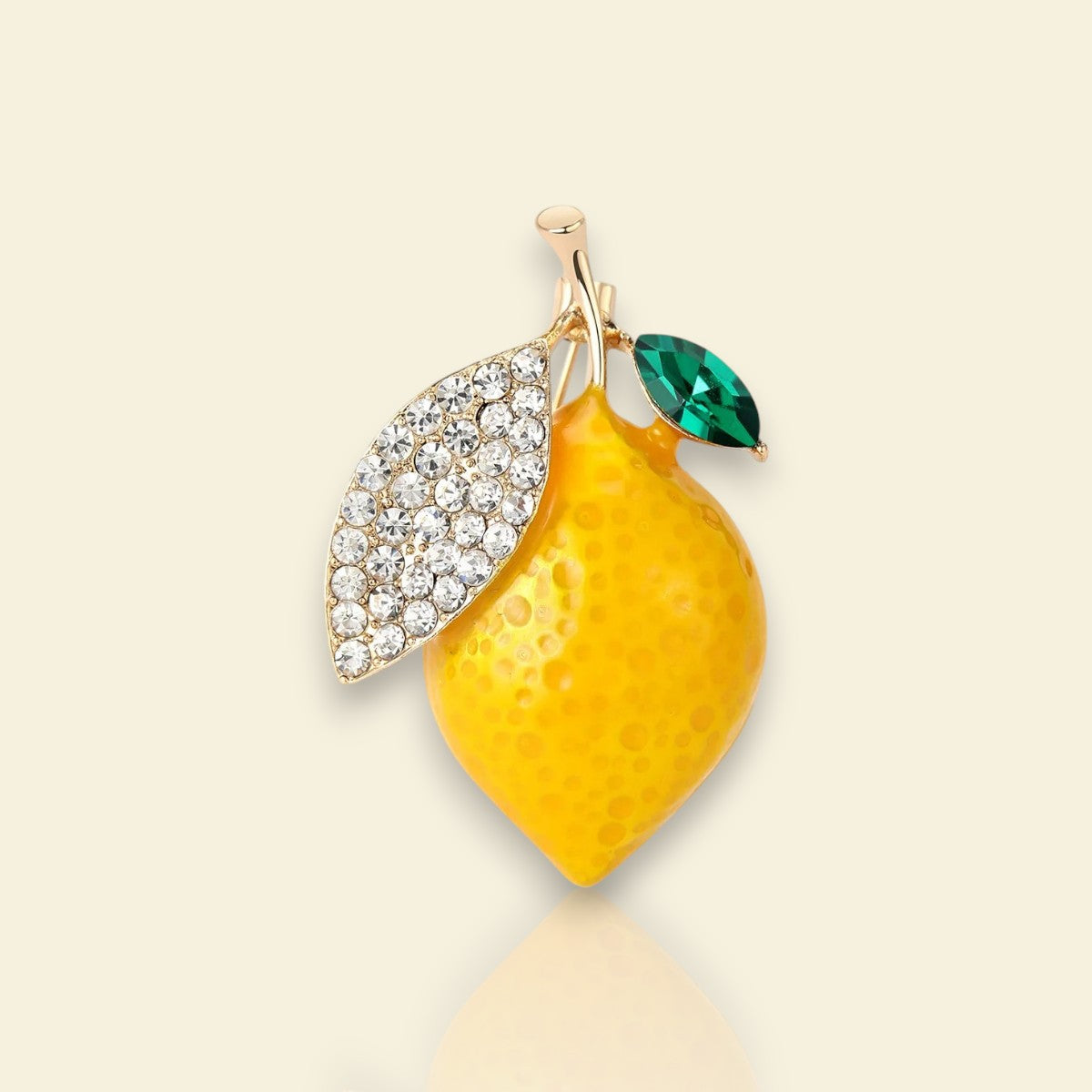 broche dorée Twistie, une broche citron, bijou tendance en 2025