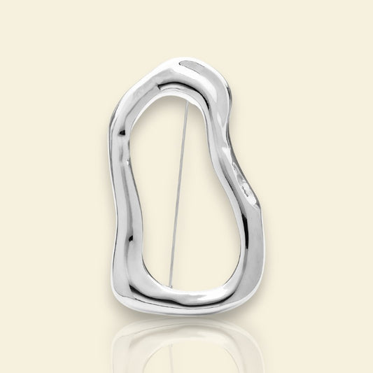 broche dorée Vetra, une broche pour vêtements abstraite