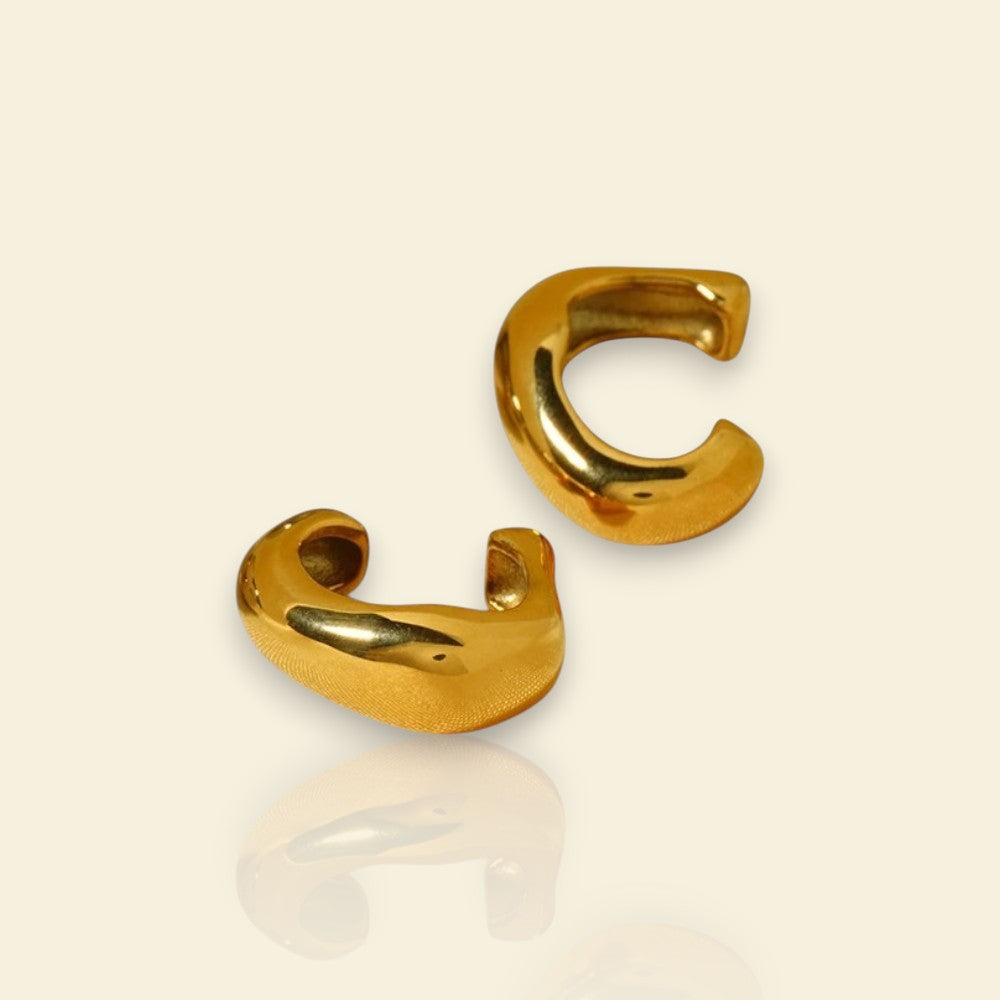 earcuff doré Sculptura en acier inoxydable, des faux piercings tendance en 2025
