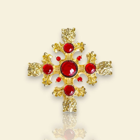 broche pour vêtement de femme Gloria, un bijou en forme de croix